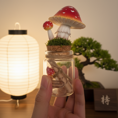 Mushroom-shaped decor in a glass jar held by a hand with a warm light in the background